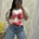 T-shirt con stampa di ciliegie e fiocco
